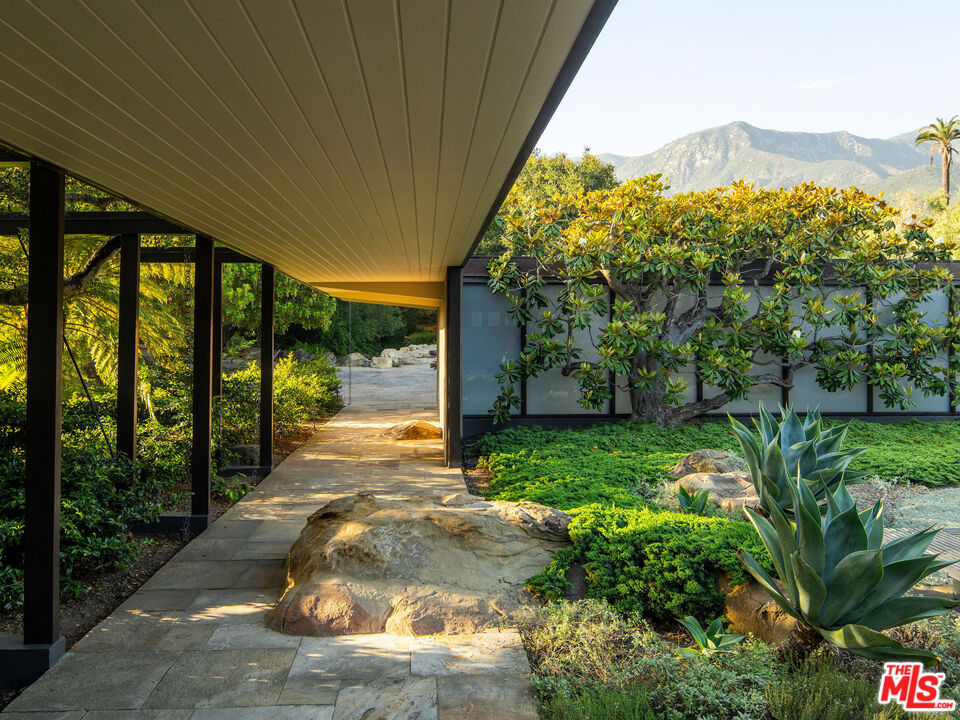 650 San Ysidro Road Santa Barbara, CA 93108 - Photo 13 of 55 a view of a garden with pathway