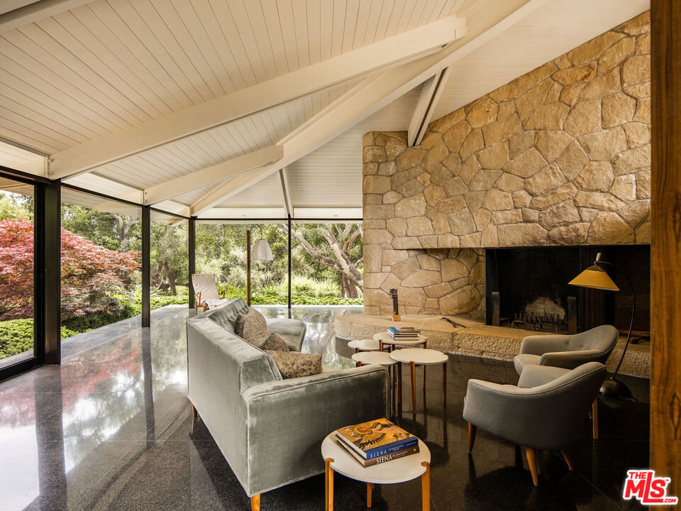 650 San Ysidro Road Santa Barbara, CA 93108 - Photo 20 of 55 a living room with furniture and a large window