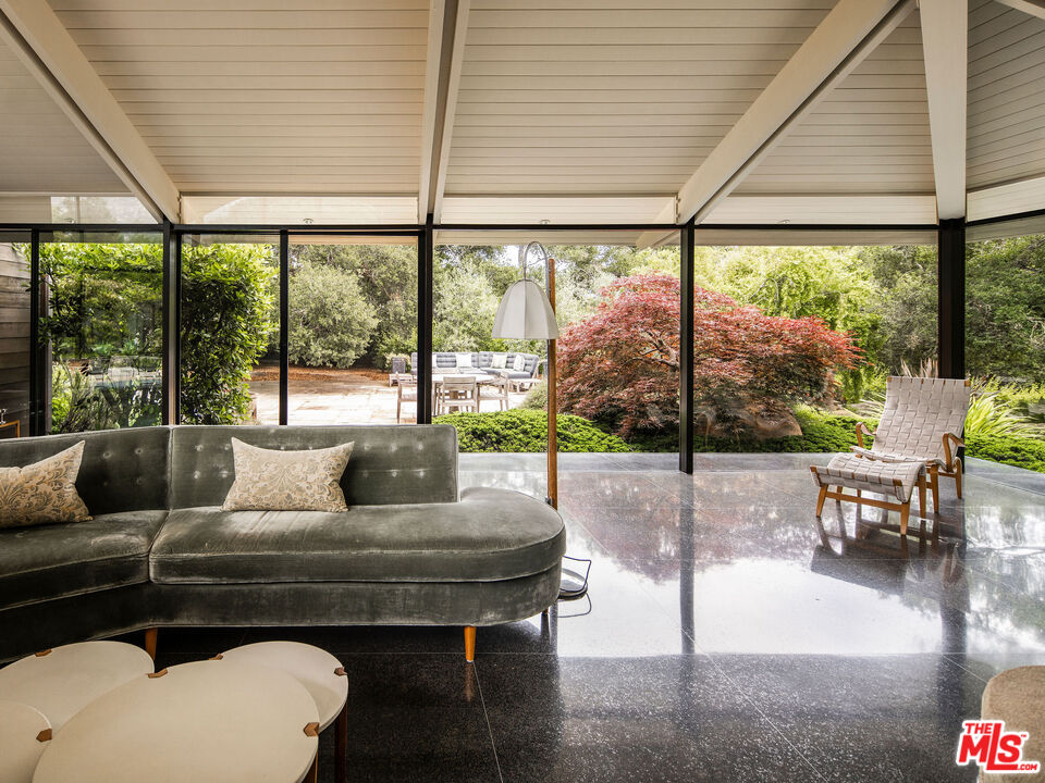 650 San Ysidro Road Santa Barbara, CA 93108 - Photo 21 of 55 a living room with furniture and a large window