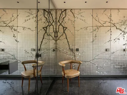 a room with furniture and a large window