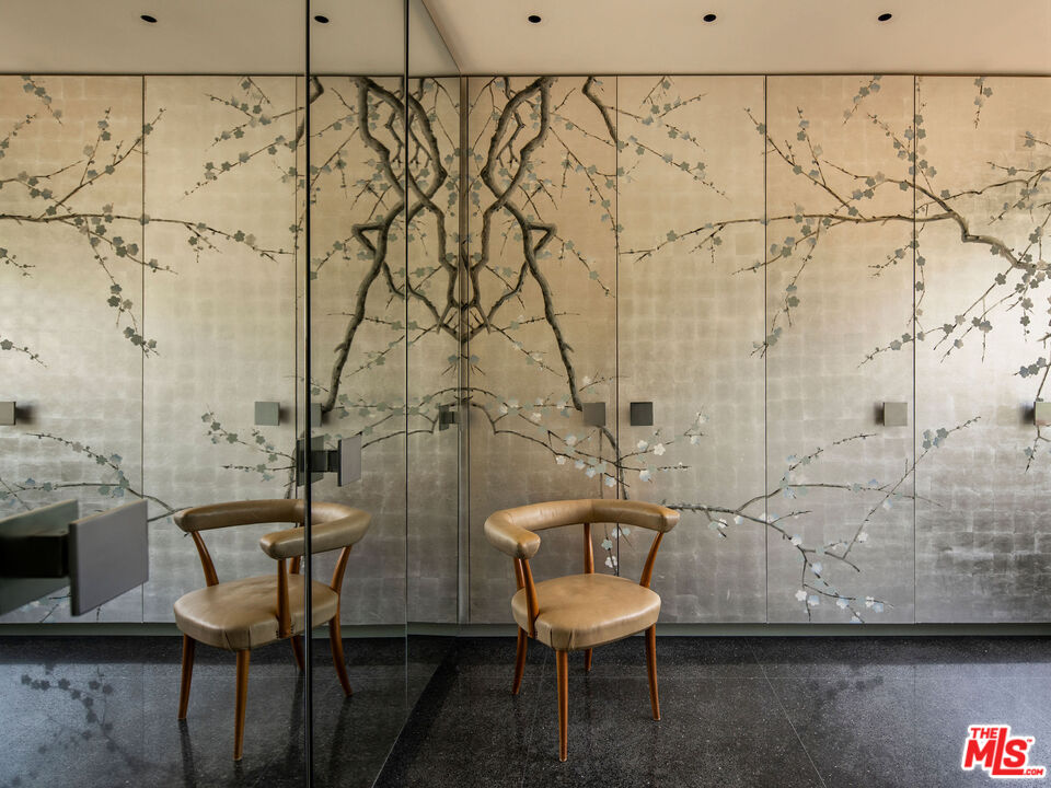 650 San Ysidro Road Santa Barbara, CA 93108 - Photo 28 of 55 a view of a bathroom with a table and chair