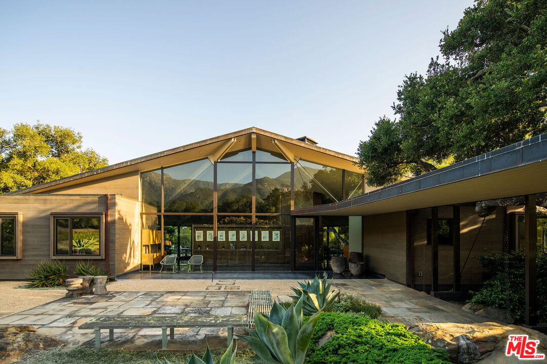 650 San Ysidro Road Santa Barbara, CA 93108 - Photo 3 of 55 a view of a chair and tables in patio