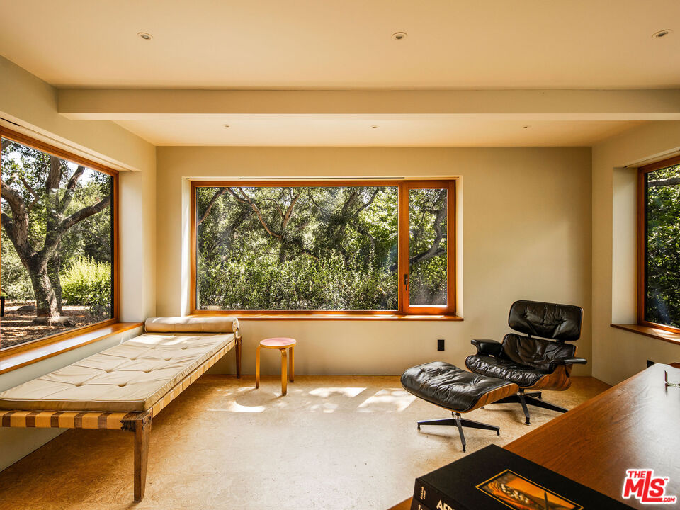 650 San Ysidro Road Santa Barbara, CA 93108 - Photo 32 of 55 a room with furniture and a window