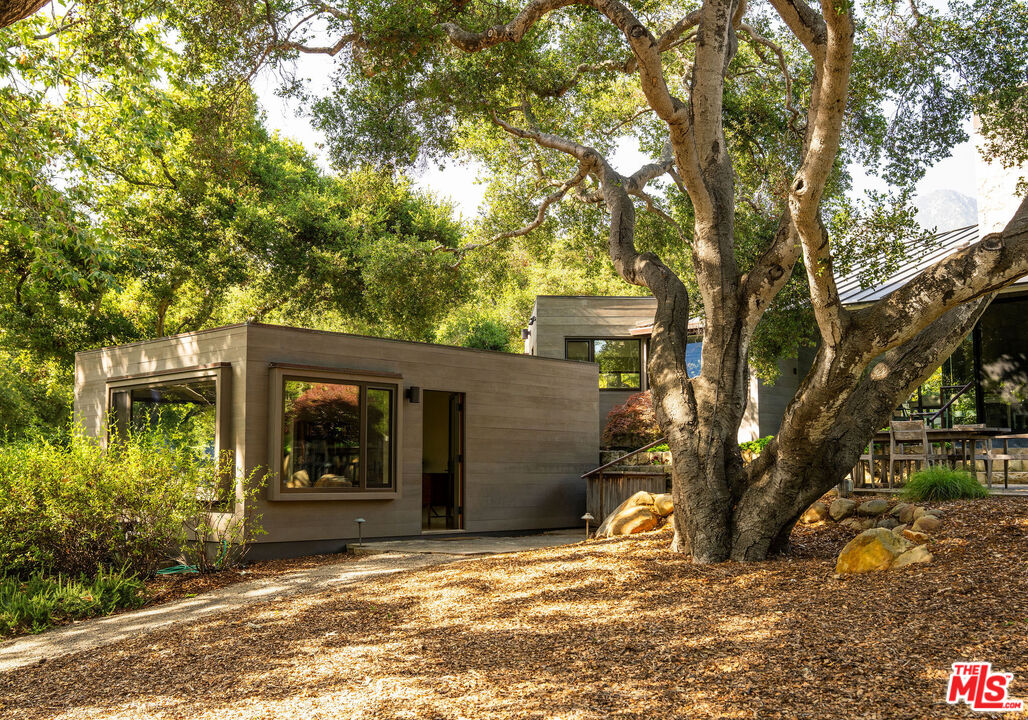 650 San Ysidro Road Santa Barbara, CA 93108 - Photo 43 of 55 a view of a house with a tree in front