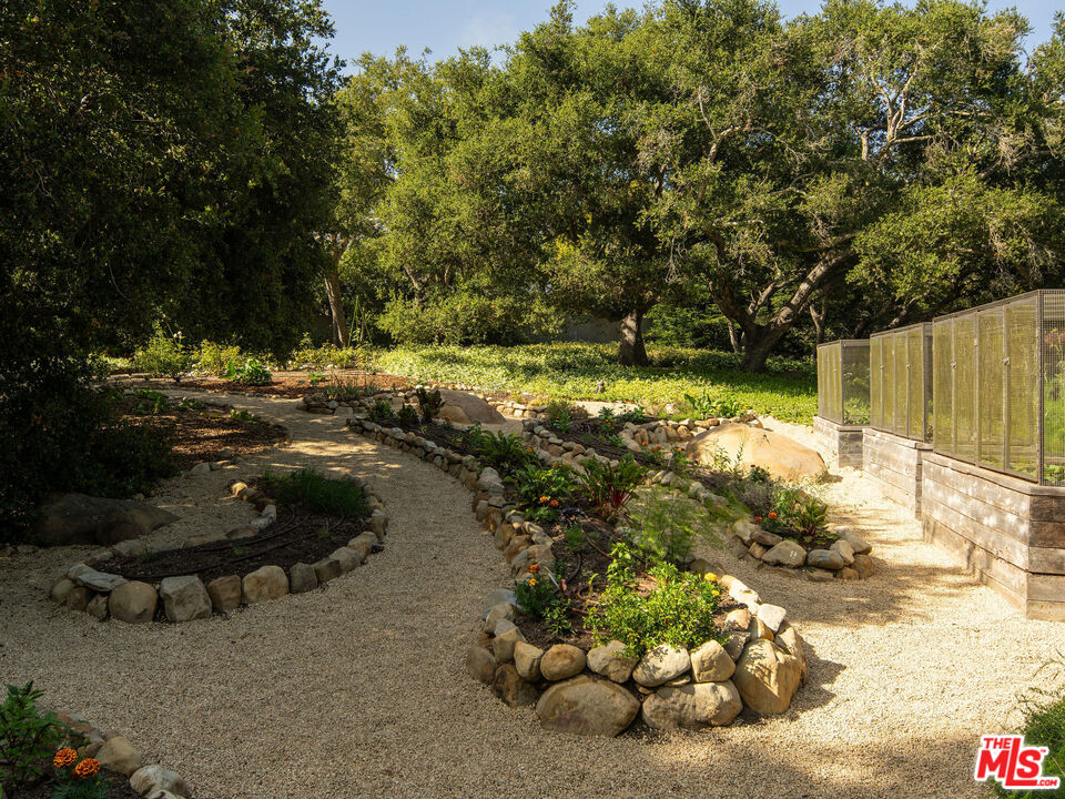 650 San Ysidro Road Santa Barbara, CA 93108 - Photo 47 of 55 a backyard of a house with lots of green space