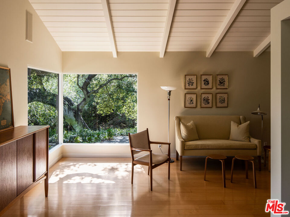 650 San Ysidro Road Santa Barbara, CA 93108 - Photo 50 of 55 a living room with furniture and a large window