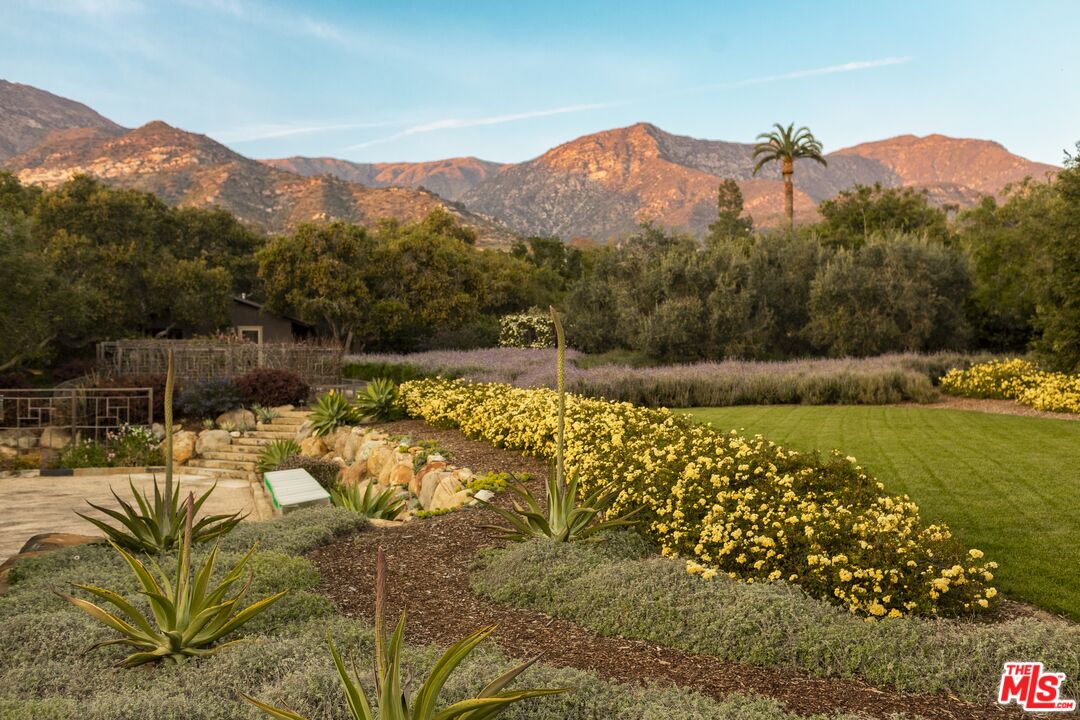 650 San Ysidro Road Santa Barbara, CA 93108 - Photo 6 of 55 a view of a house with a yard