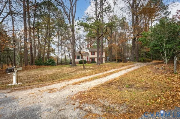 a swimming pool with trees in the background