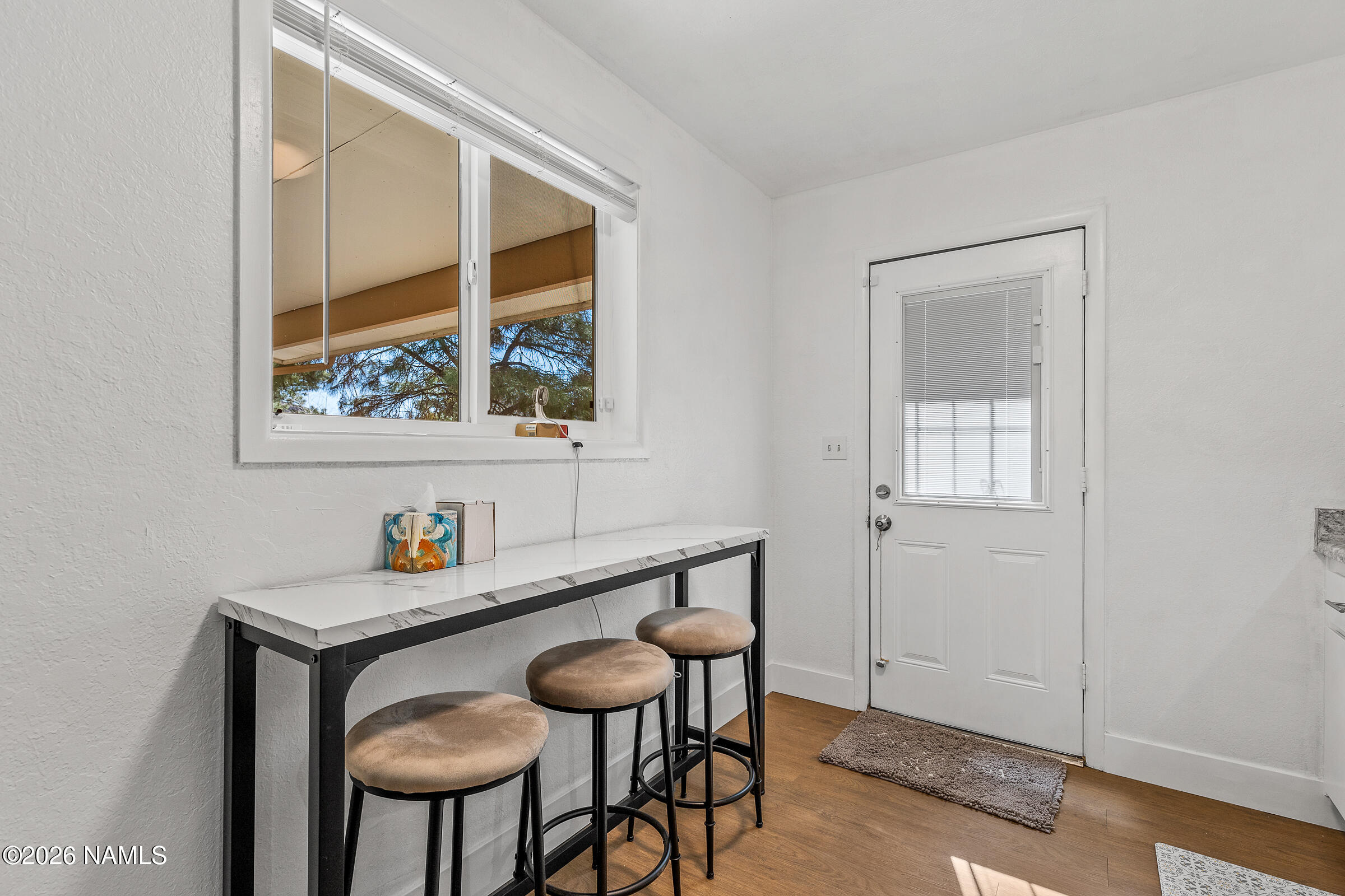 4367 East Hollygreen Road Flagstaff, AZ 86004 - Photo 11 of 21 a dining room with table and chair