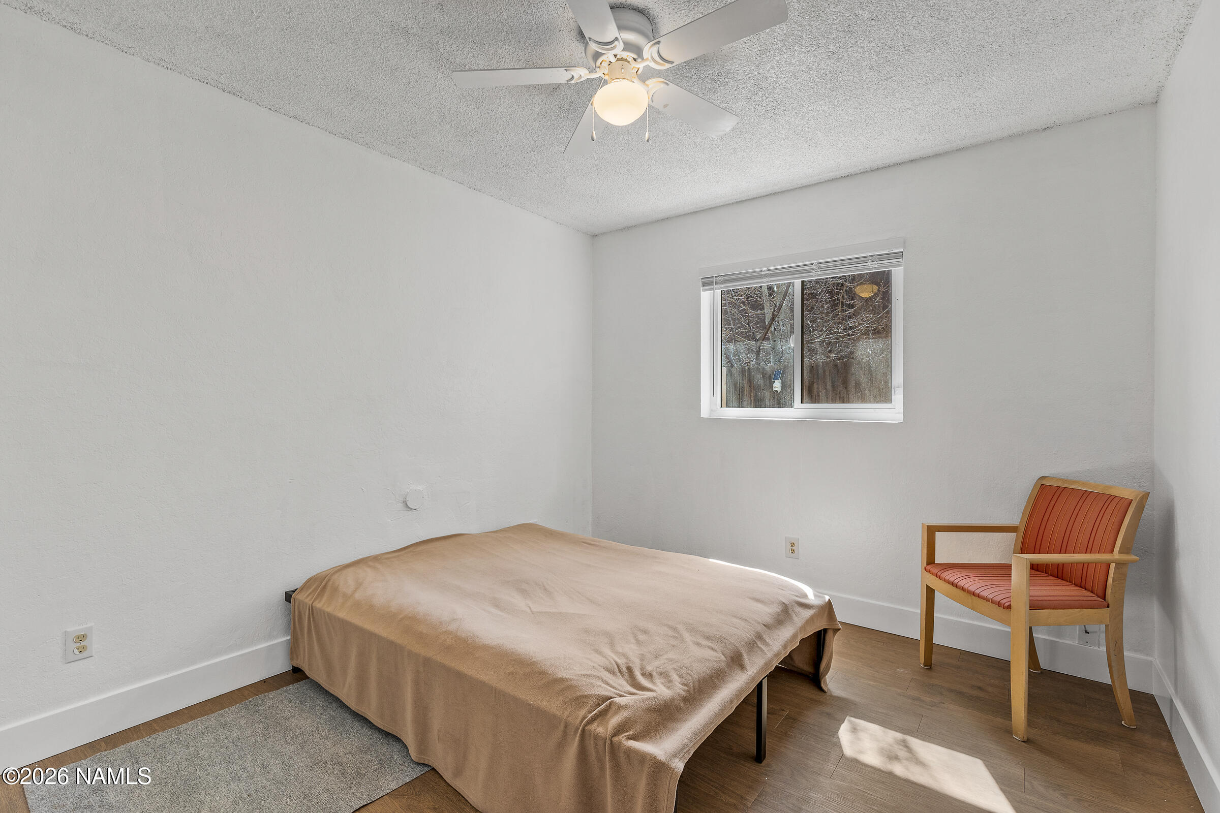 4367 East Hollygreen Road Flagstaff, AZ 86004 - Photo 6 of 21 a bedroom with a bed and a desk
