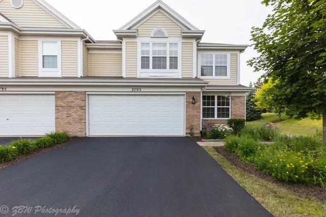 front view of a house with a street