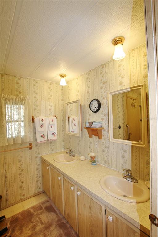 1236 Chobee Loop Okeechobee, FL 34974 - Photo 24 of 39 Primary Bathroom