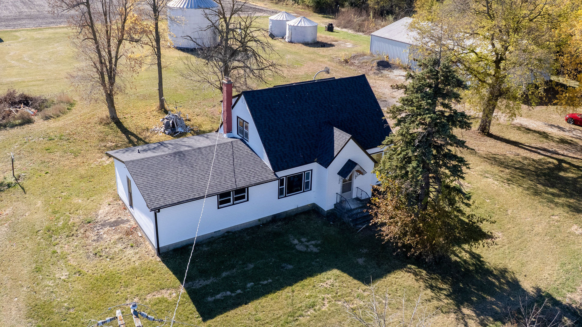 an aerial view of house with yard