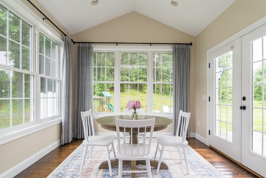 7 Red Gap Road Wilbraham, MA 01095 - Photo 12 of 31 a dining room with furniture a chandelier and wooden floor
