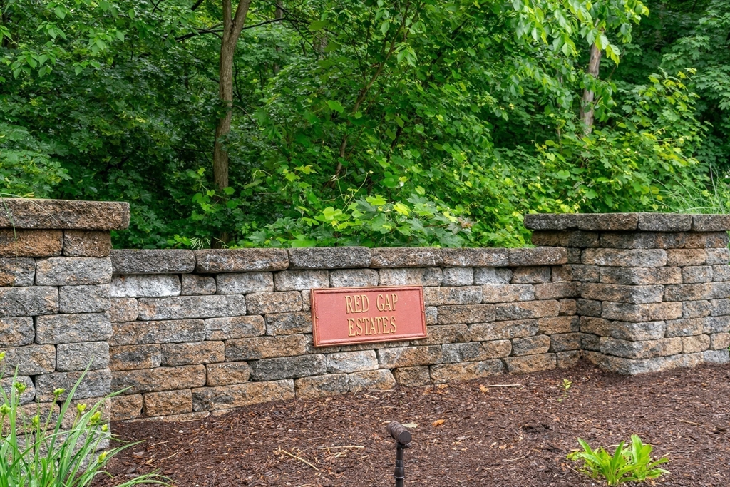 7 Red Gap Road Wilbraham, MA 01095 - Photo 27 of 31 a view of house with a bench