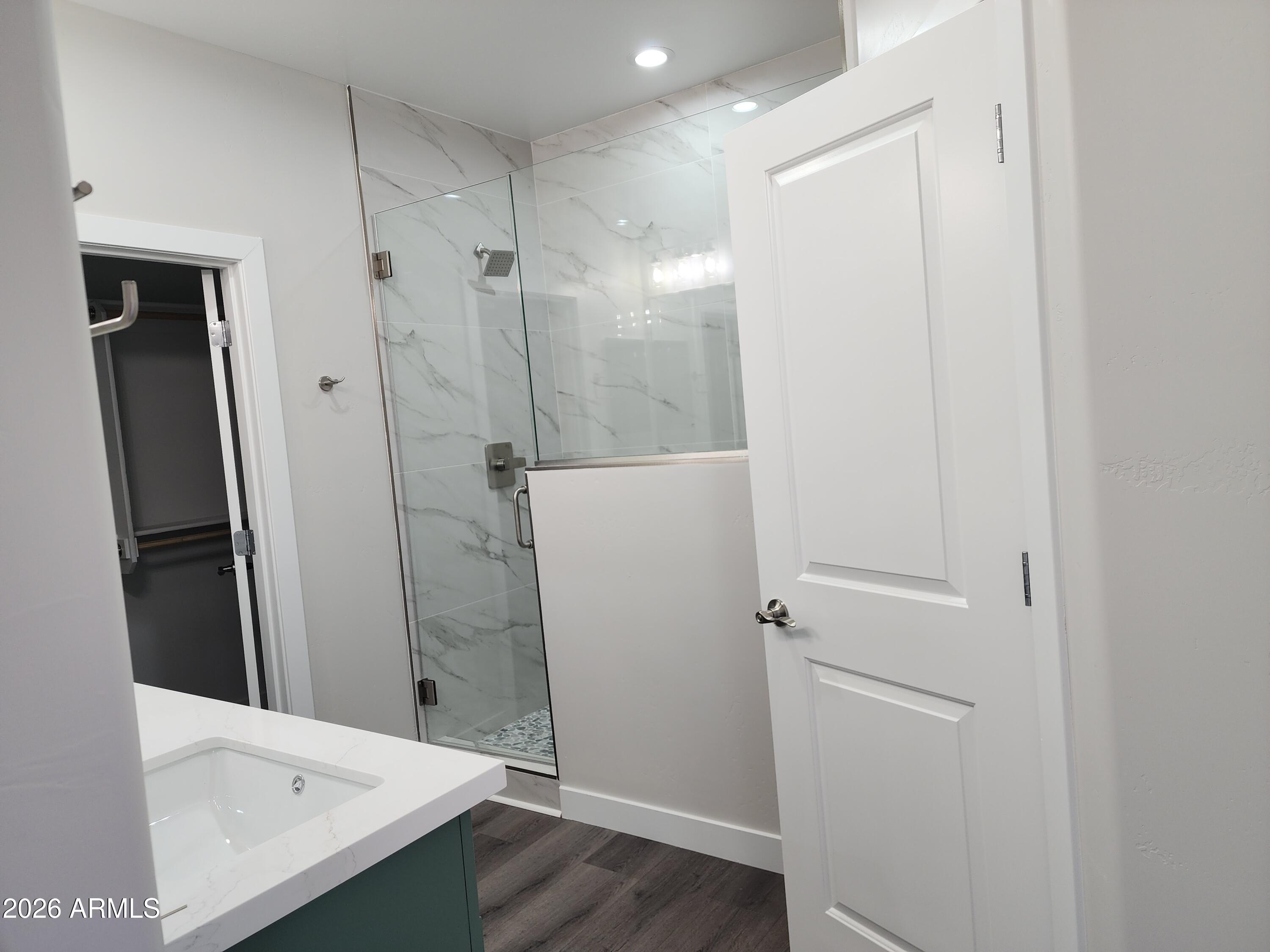 13564 South Durango Road Arizona City, AZ 85123 - Photo 15 of 30 a bathroom with a sink and shower