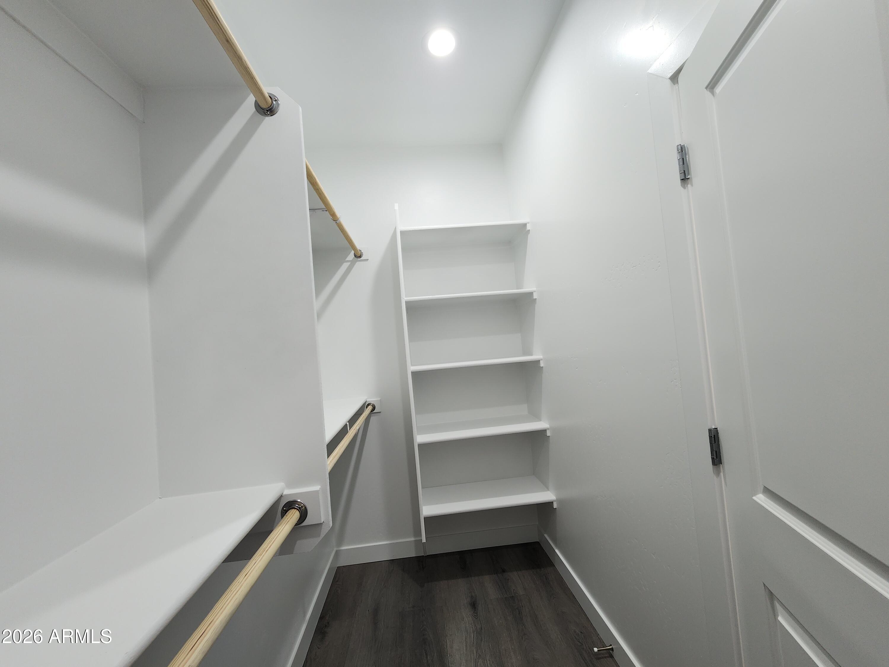 13564 South Durango Road Arizona City, AZ 85123 - Photo 18 of 30 a view of room with empty racks