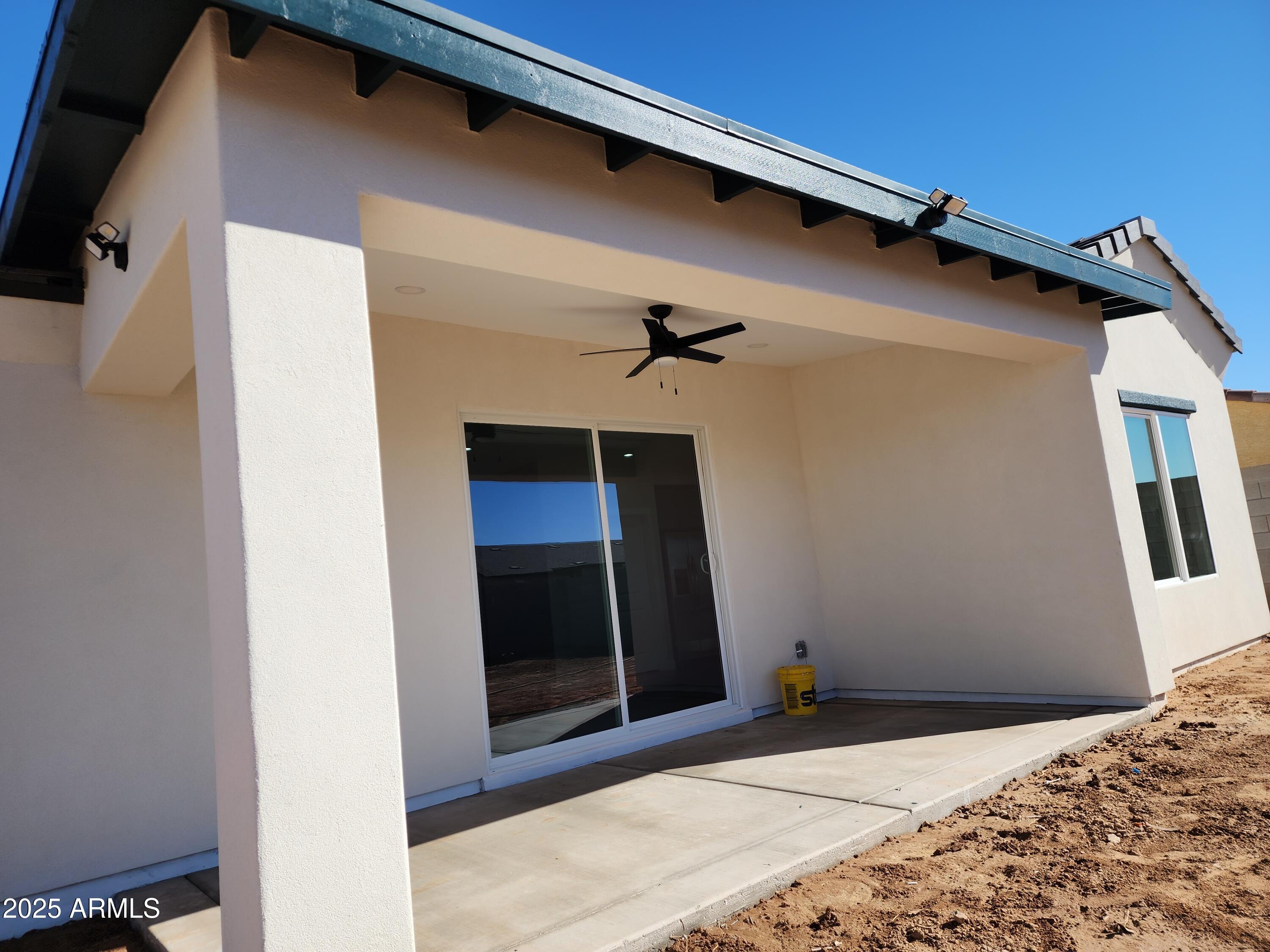 13564 South Durango Road Arizona City, AZ 85123 - Photo 5 of 30 a bedroom with a bed and the wall painting