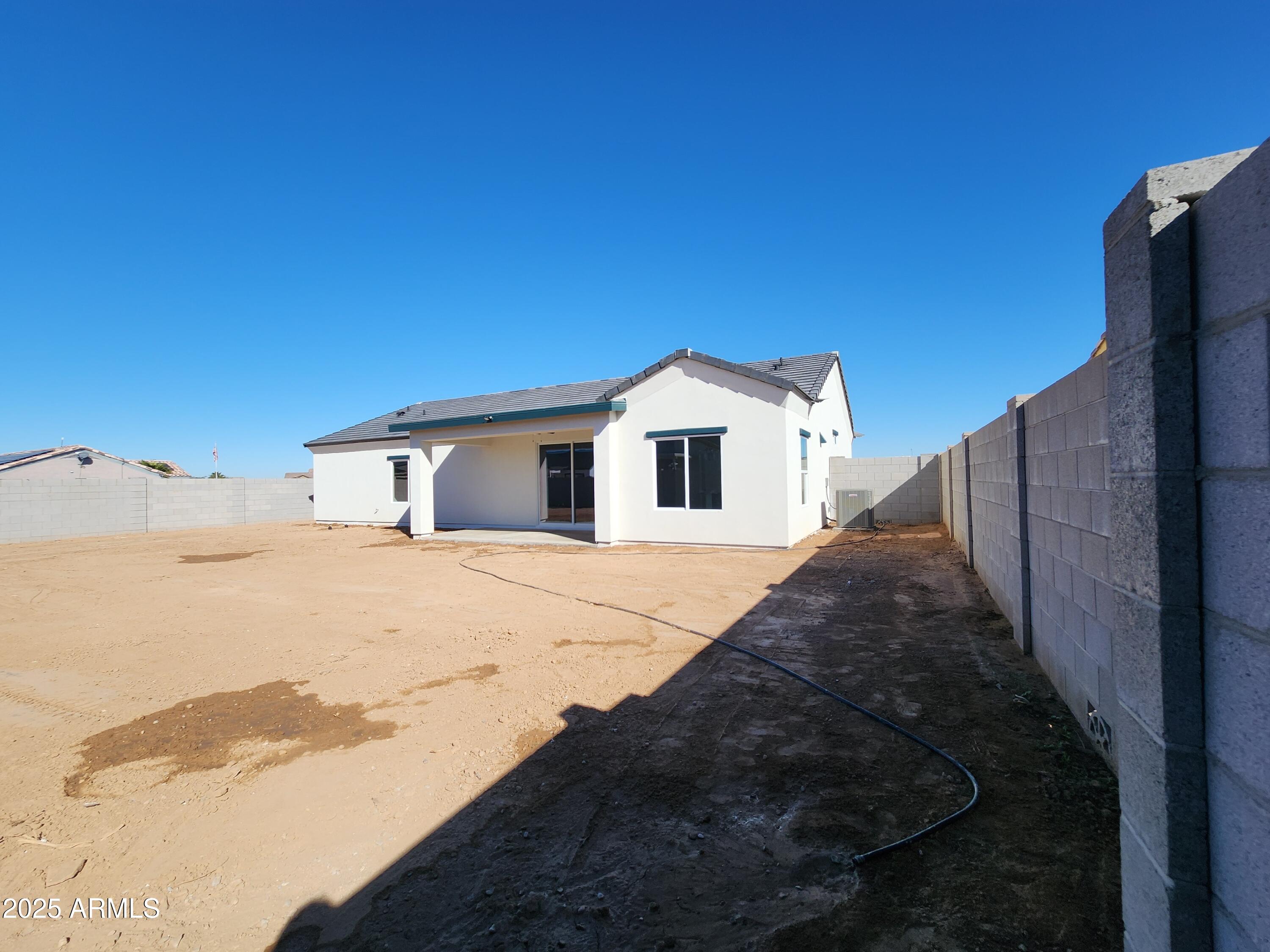 13564 South Durango Road Arizona City, AZ 85123 - Photo 6 of 30 a view of a house with backyard