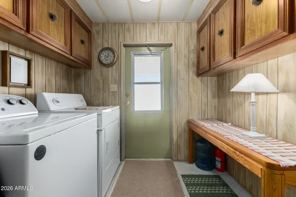 a utility room with dryer and washer