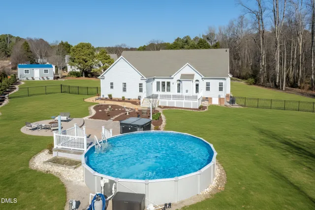 a view of balcony with deck and wooden floor