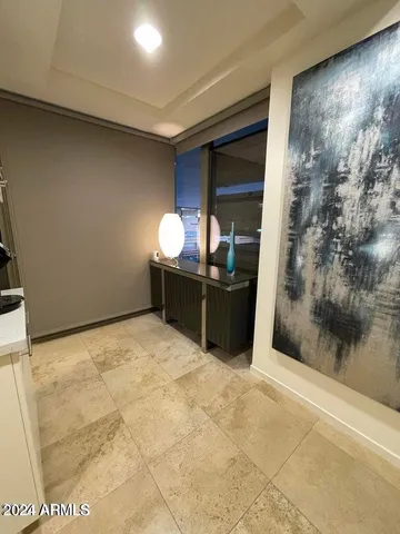 a view of room with window and bathroom