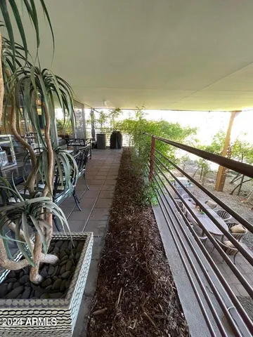 a view of a back yard of the house