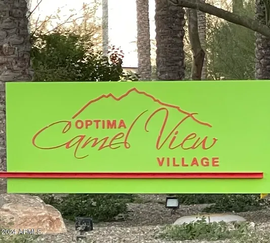 a sign on the side of the road