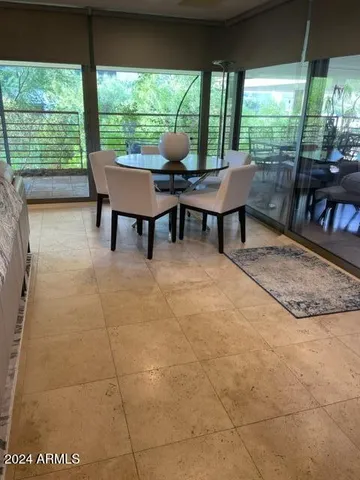 a room with furniture and a large window