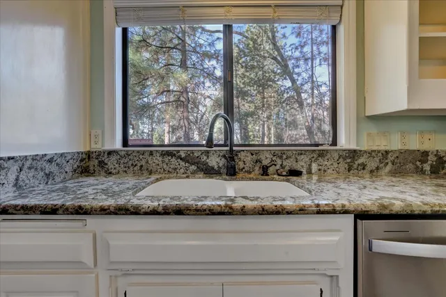 a view of livingroom with furniture and windows