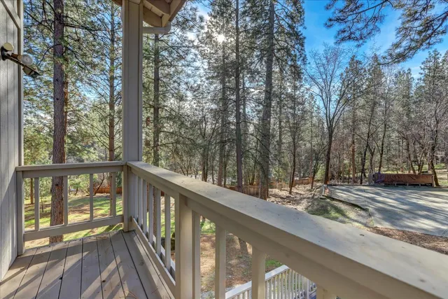 a view of a town with mountains in the background