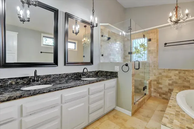 a view of a backyard with large trees