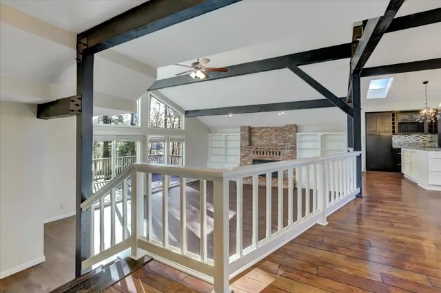a view of a livingroom with wooden floor