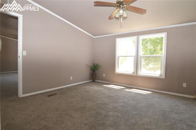 27055 Handle Road Calhan, CO 80808 - Photo 11 of 25 Another view of the master bedroom with the door into the living room.