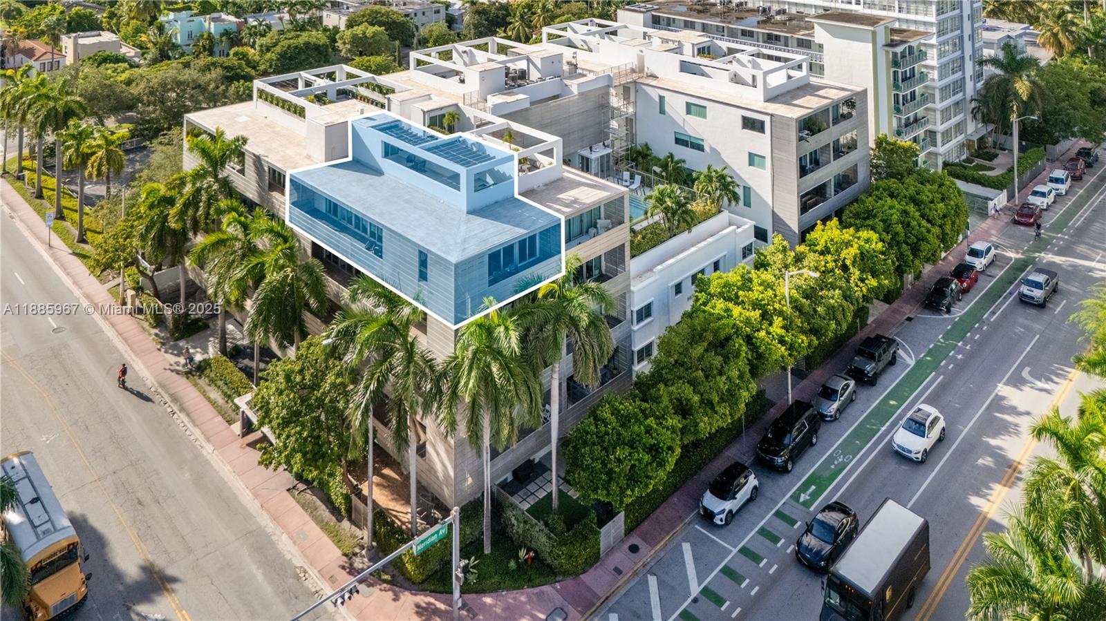 1700 Meridian Avenue, Unit 501 Miami Beach, FL 33139 - Photo 1 of 57 an aerial view of a house with a yard and garden