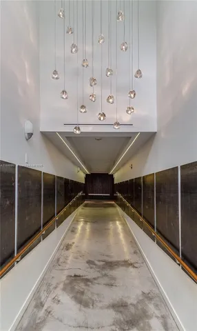 a view of front door with wooden floor