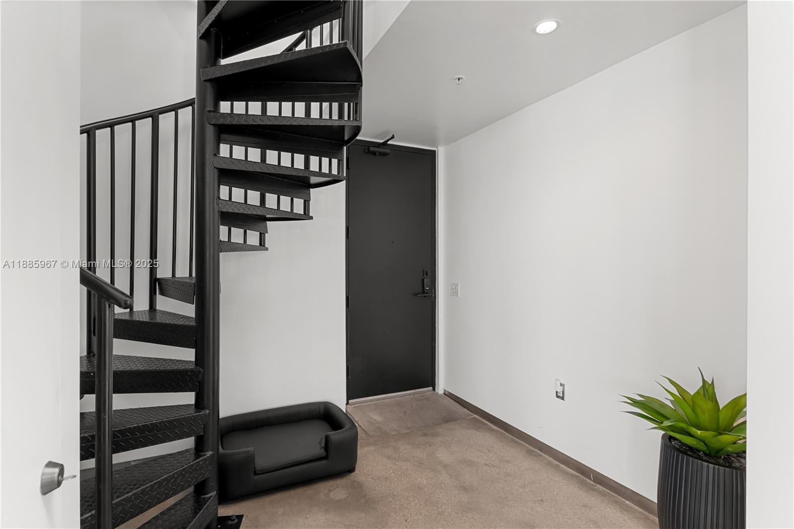 1700 Meridian Avenue, Unit 501 Miami Beach, FL 33139 - Photo 16 of 57 a view of front door with wooden floor