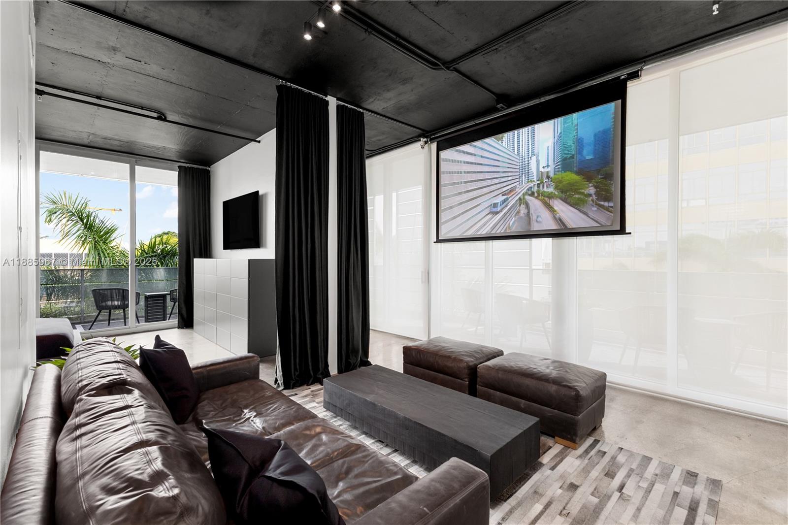 1700 Meridian Avenue, Unit 501 Miami Beach, FL 33139 - Photo 29 of 57 a bedroom with furniture and a large window