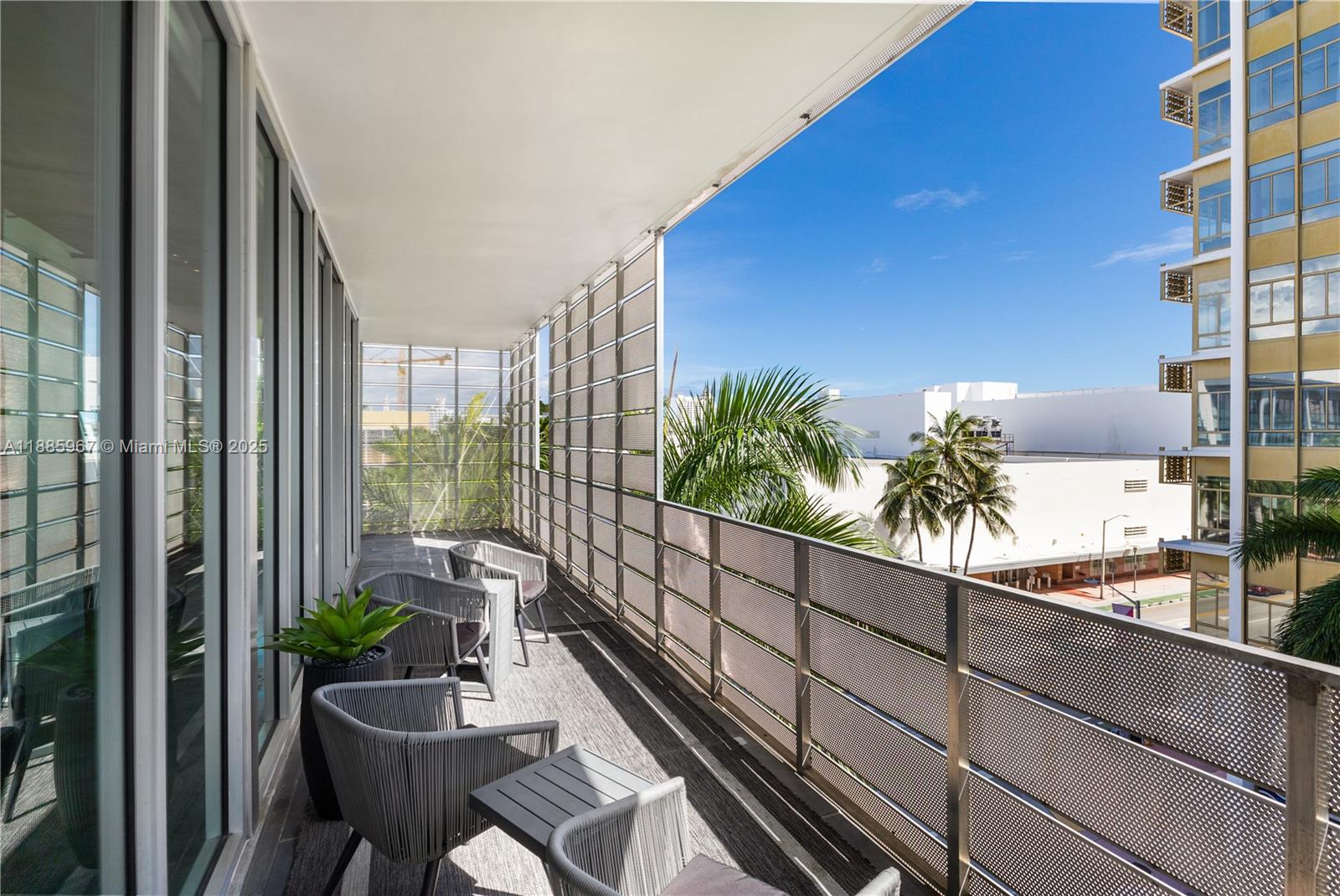 1700 Meridian Avenue, Unit 501 Miami Beach, FL 33139 - Photo 33 of 57 a view of a balcony with potted plants