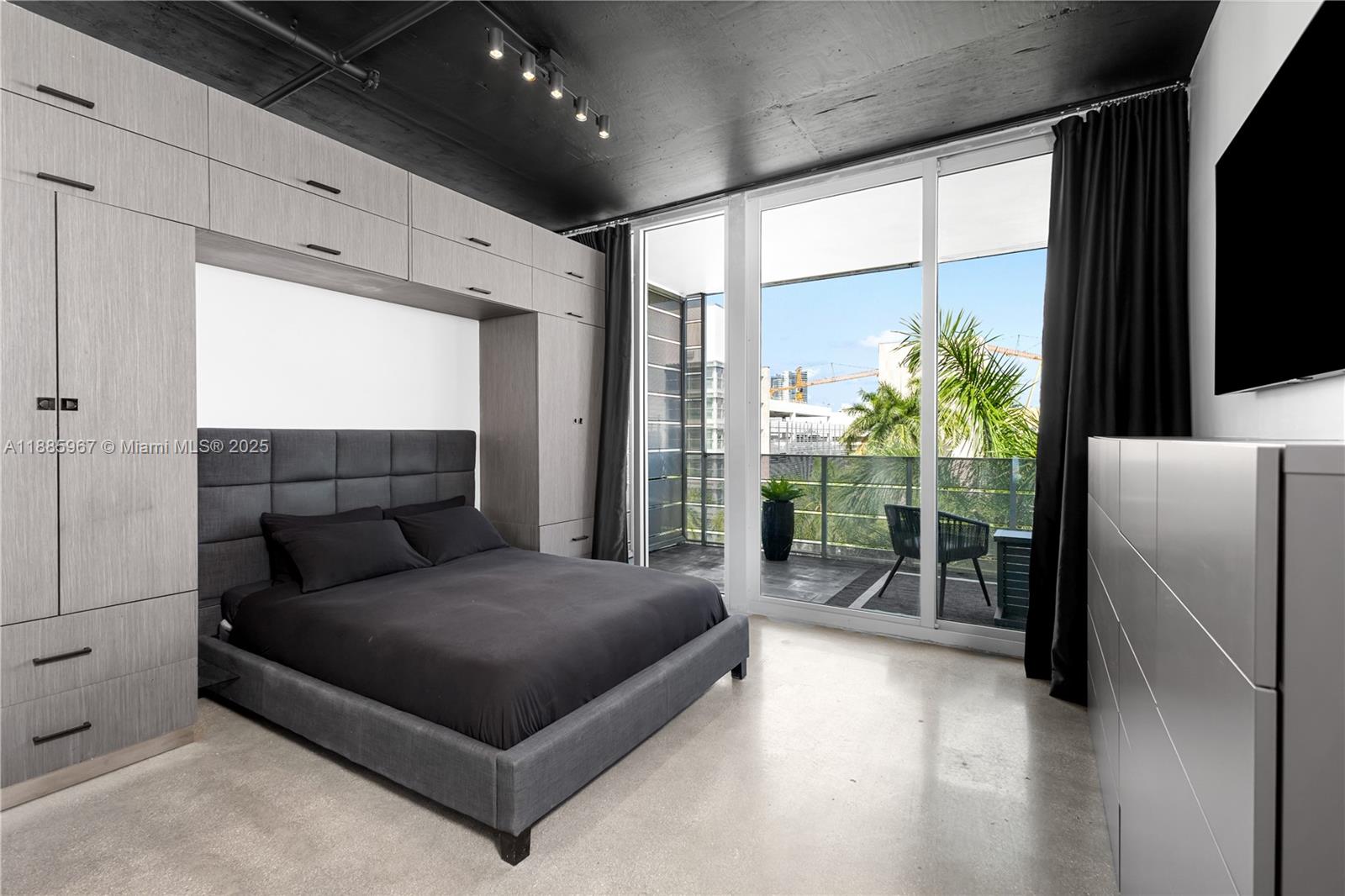 1700 Meridian Avenue, Unit 501 Miami Beach, FL 33139 - Photo 35 of 57 a living room with furniture and a potted plant