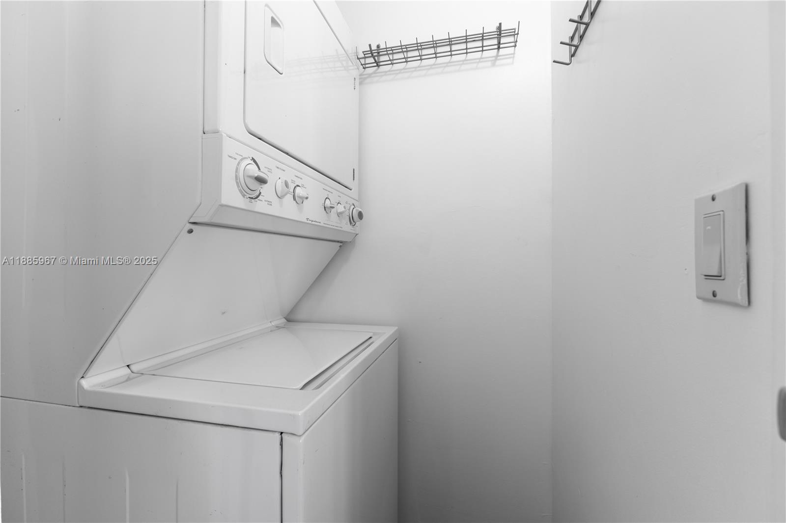 1700 Meridian Avenue, Unit 501 Miami Beach, FL 33139 - Photo 54 of 57 a utility room with dryer and washer