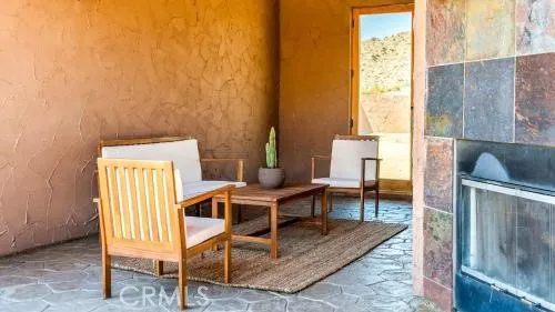 a living room with a couch and a window