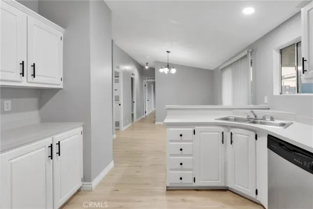 a bathroom with a sink vanity and a mirror