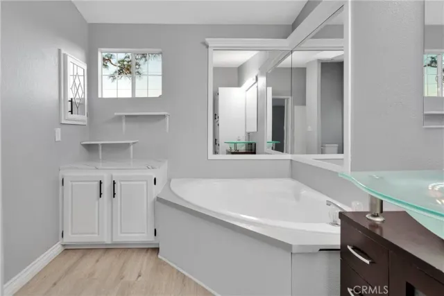 a bathroom with a sink and a bathtub