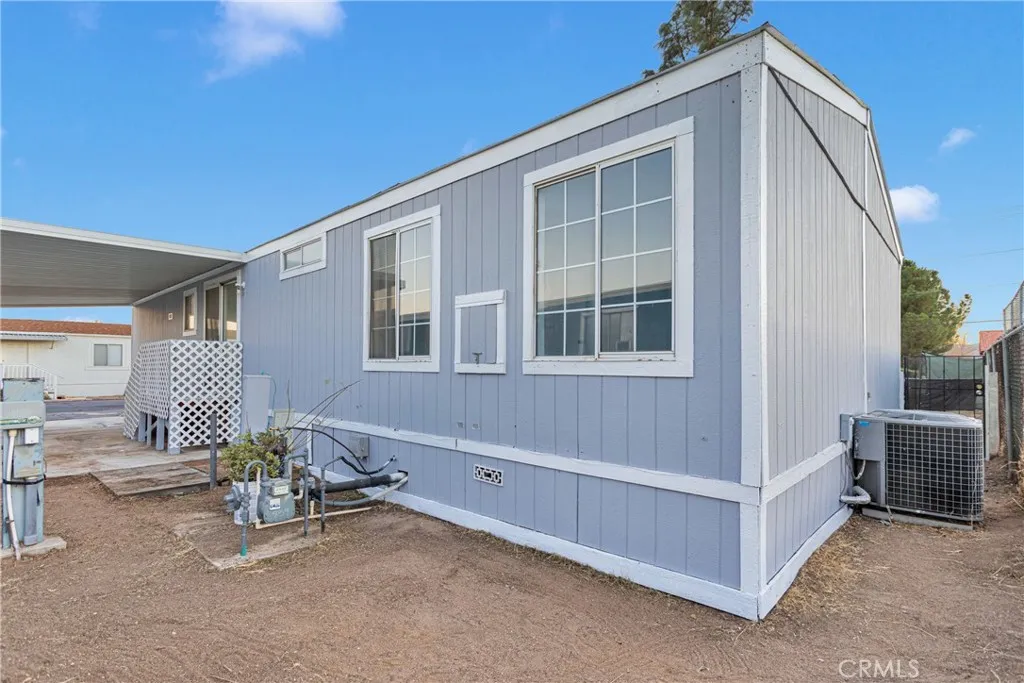 8450 G, Unit 63 Hesperia, CA 92345 - Photo 31 of 31 a view of an outdoor space with porch and furniture