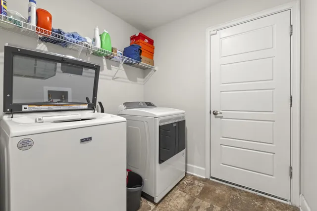 a living room with furniture and a yard