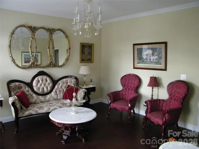 a bathroom with a mirror a sink and a mirror