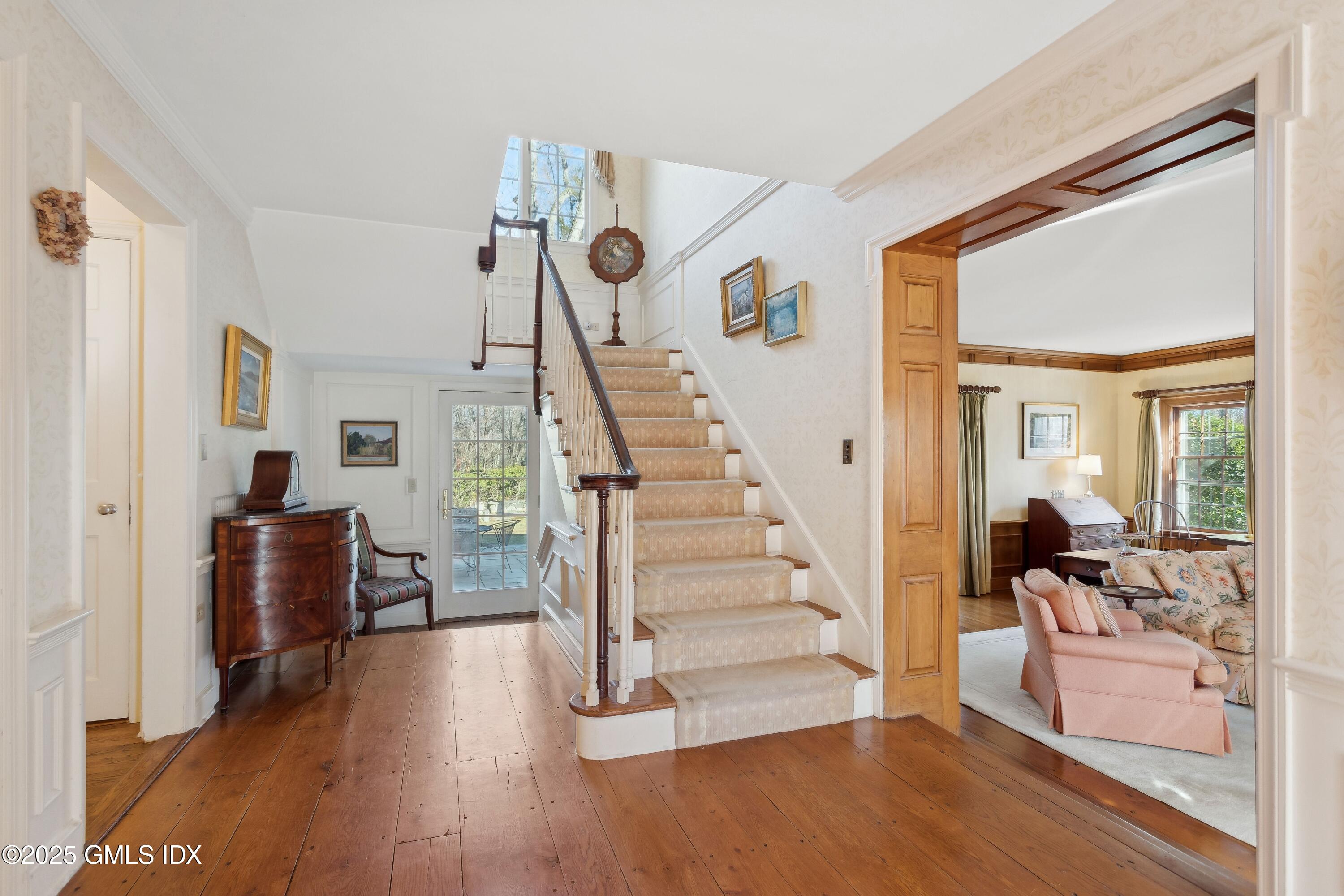 2 Laurel Road Stamford, CT 06903 - Photo 3 of 24 a view of entryway and hall with wooden floor