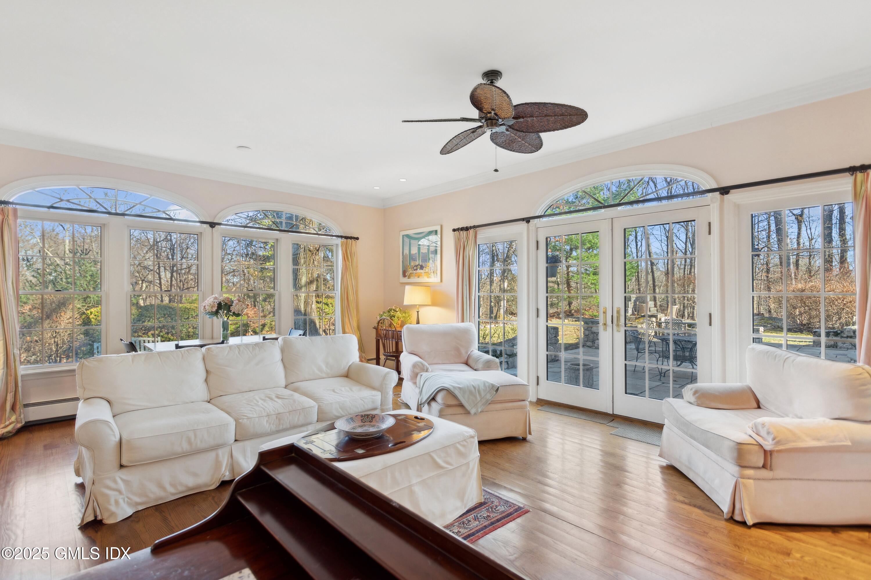 2 Laurel Road Stamford, CT 06903 - Photo 10 of 24 a living room with furniture and a large window