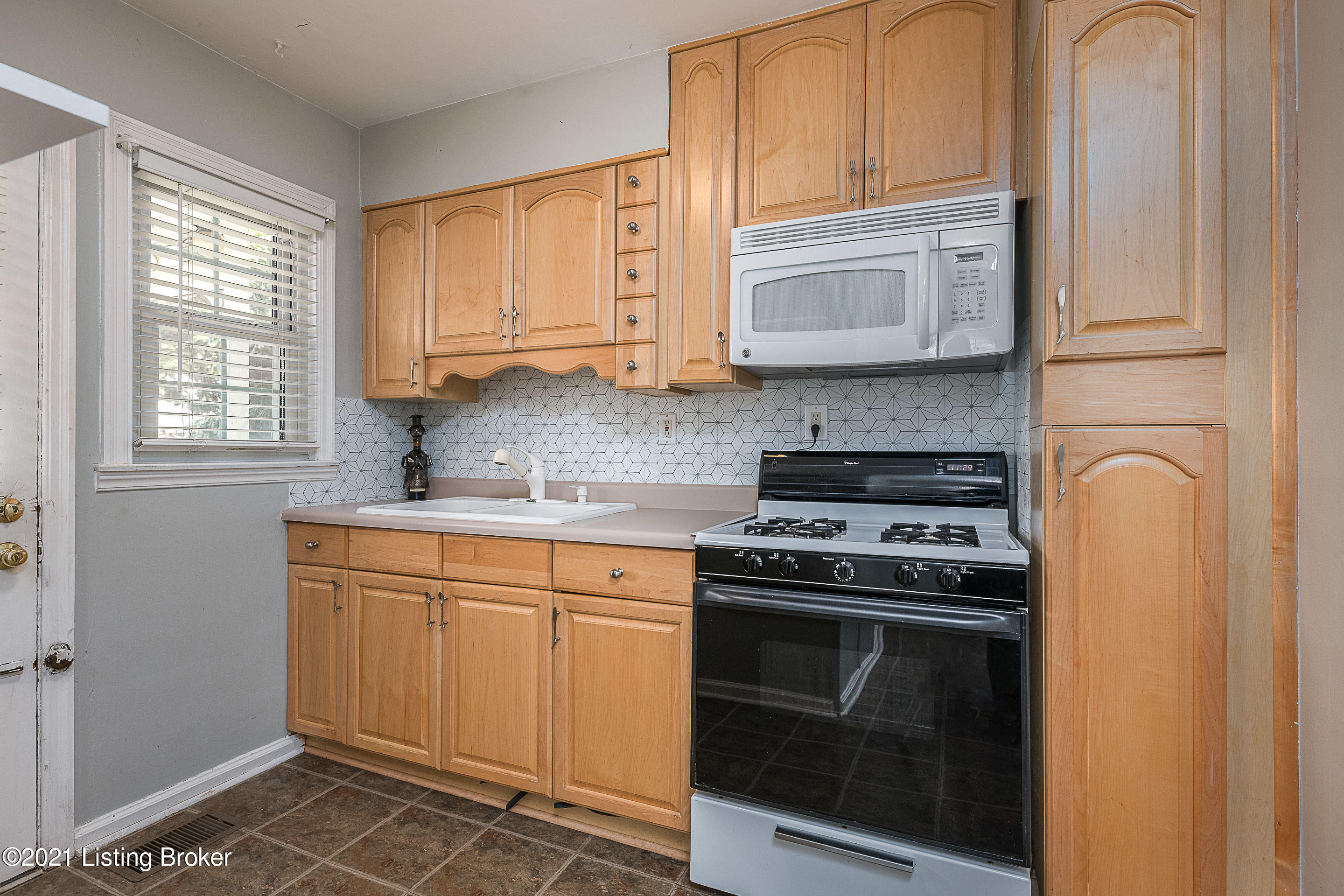 2500 Sherry Road Louisville, KY 40217 - Photo 12 of 28 THE KITCHEN HAS NEWER CABINTERY. ALL APPLIANCES AS SEEN WILL REMAIN.
